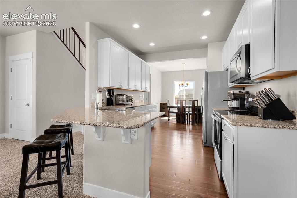 Image 13 of 40: Notice there recessed lights