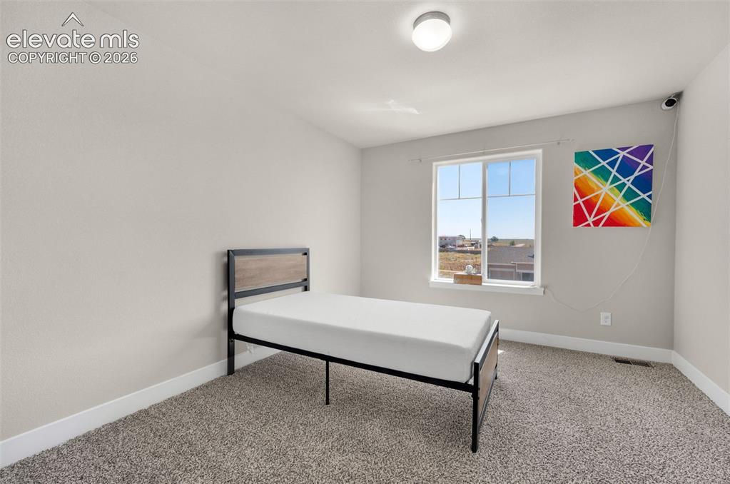 Image 27 of 40: 2nd bedroom located upstairs