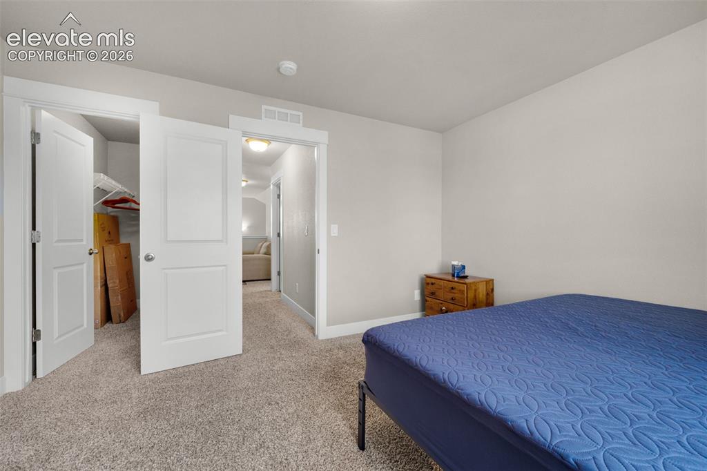 Image 32 of 40: All bedrooms are carpeted