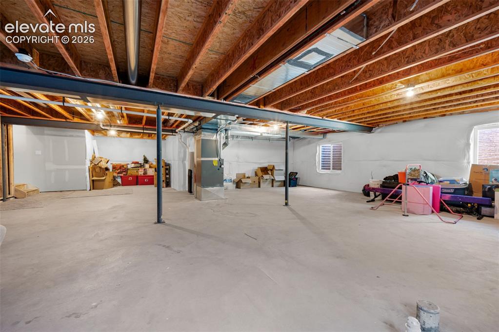 Image 33 of 40: So many possibilities with this very large unfinished basement
