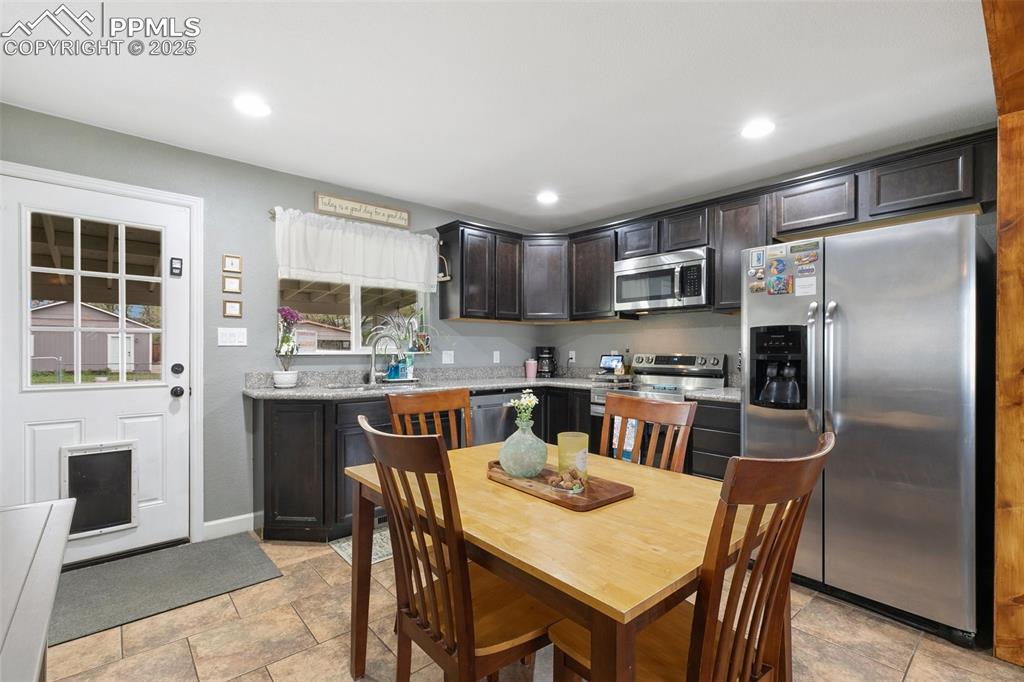 Image 10 of 29: Kitchen appliances are included.