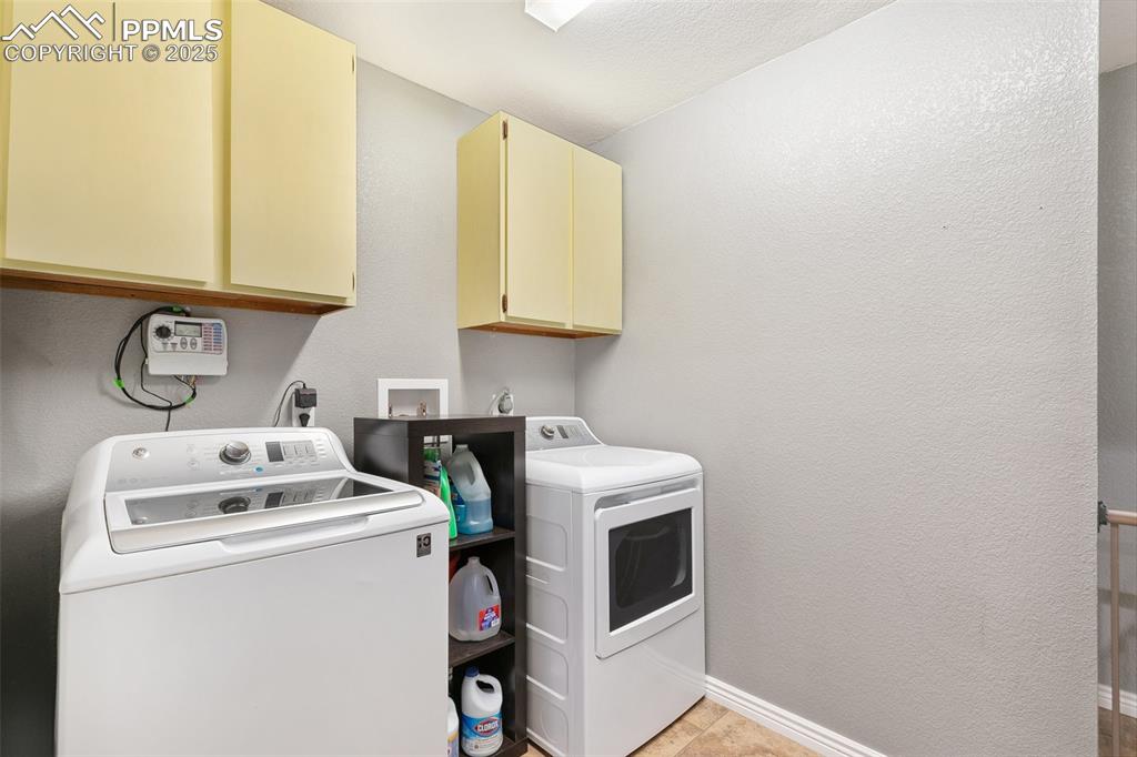 Image 12 of 29: The Laundry area is off the Kitchen.