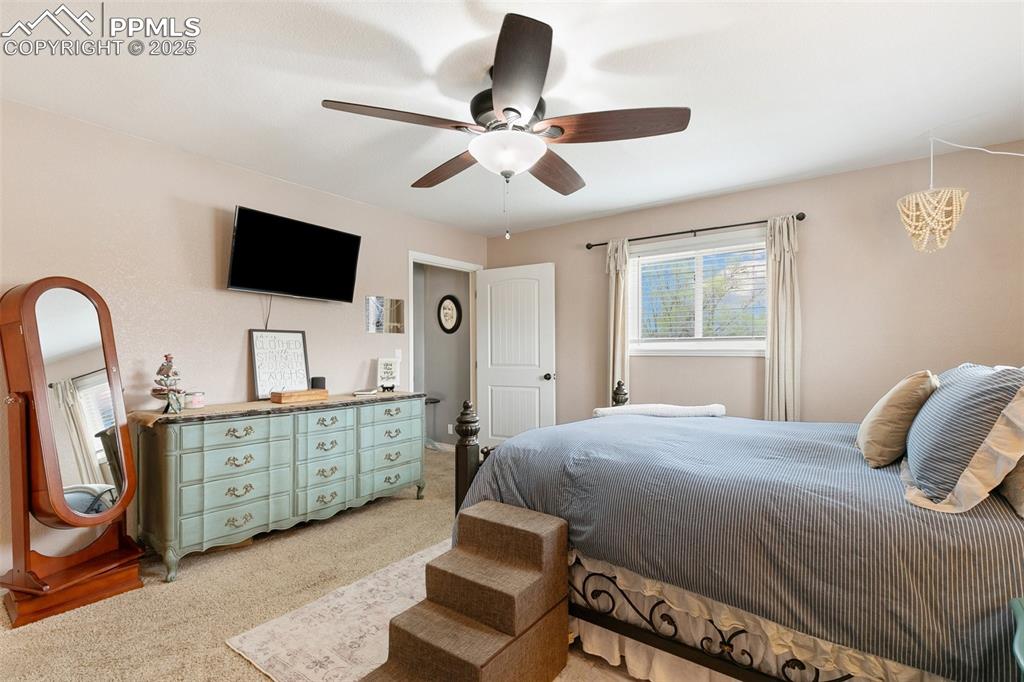 Image 15 of 29: The Primary Bedroom is spacious yet cozy.