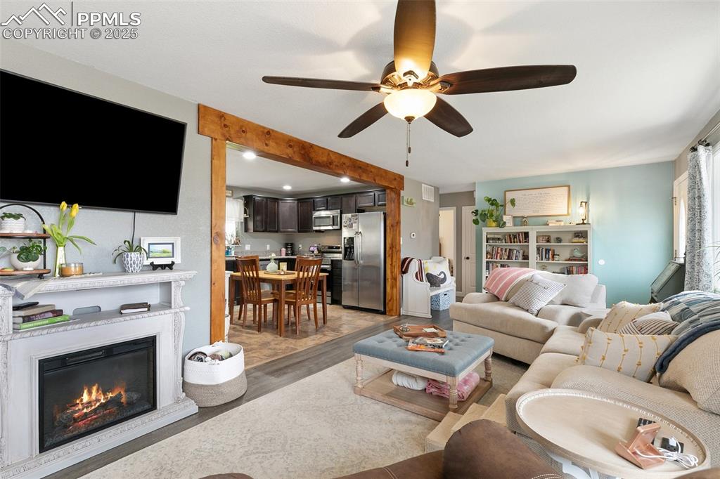 Image 7 of 29: The Living Room and Kitchen are a great place to entertain!