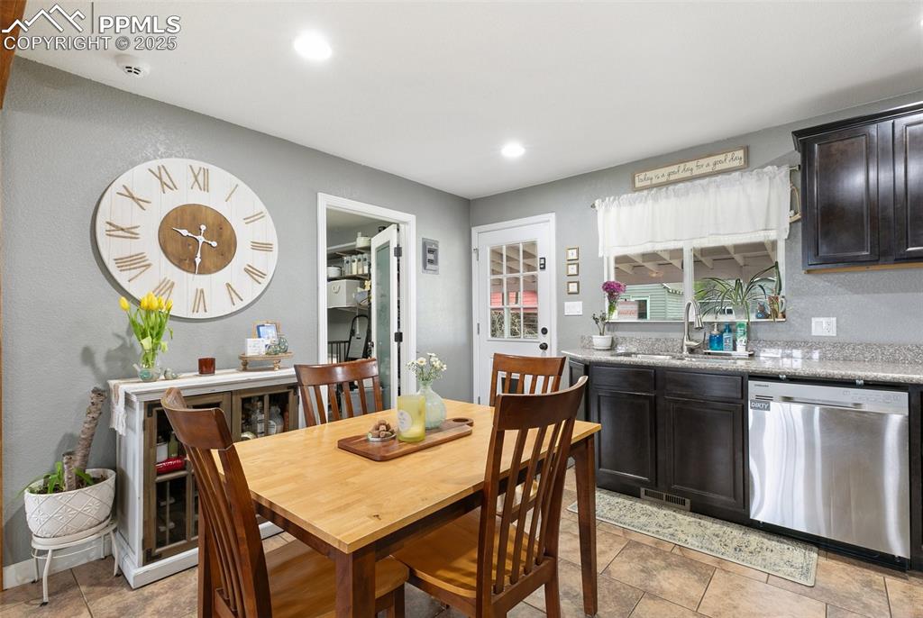 Image 9 of 29: The Dining Area is light and bright.