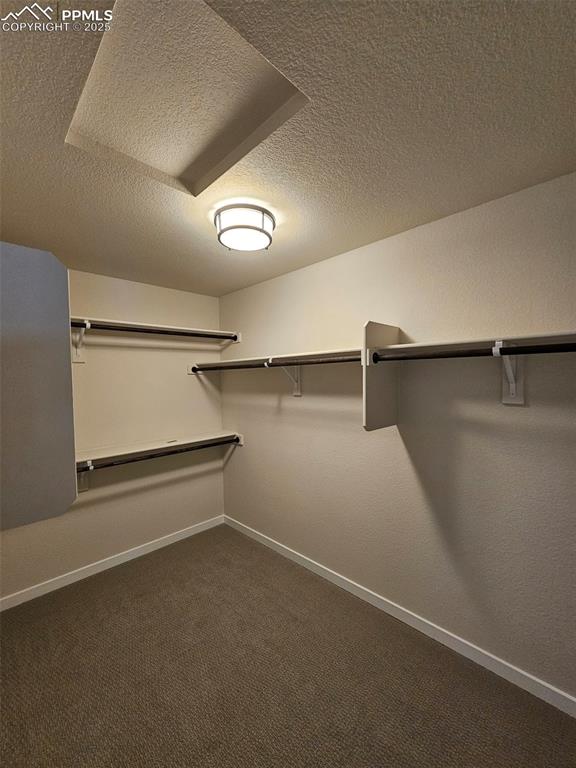 Image 16 of 24: Primary bedroom closet