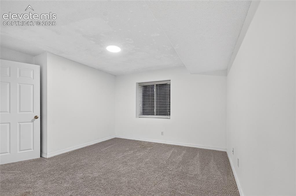 Image 21 of 27: Basement bedroom #4