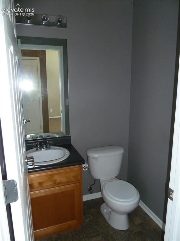 Image 12 of 18: Main level half bath / powder room.