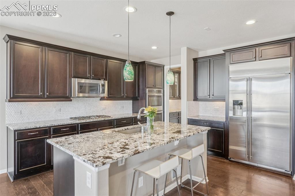 Image 16 of 50: Gourmet Kitchen with granite countertops