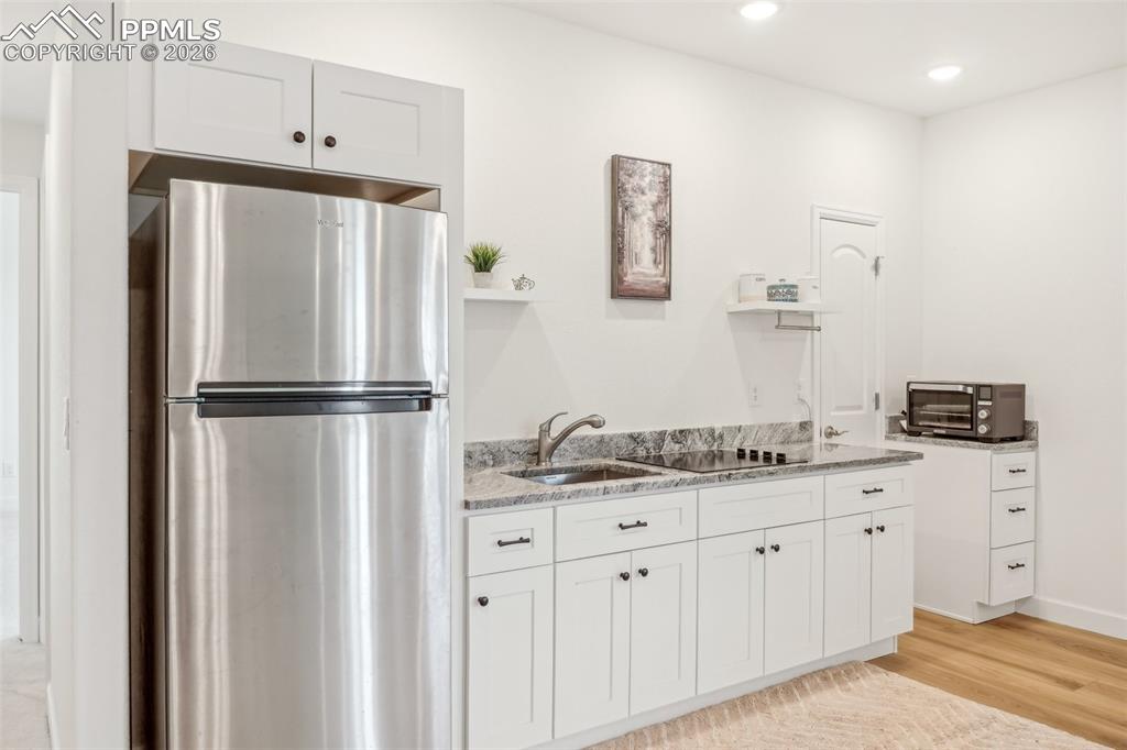 Image 40 of 50: Bedroom 5 in basement, conforming with views, walk in closet