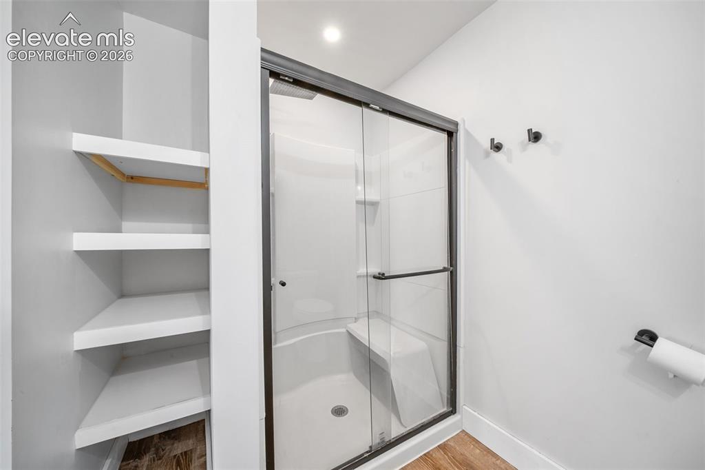 Image 21 of 50: secondary bedrooms ensuite walk in shower