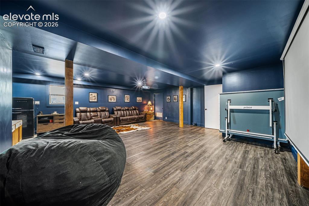 Image 30 of 50: incredible media/game room is spacious