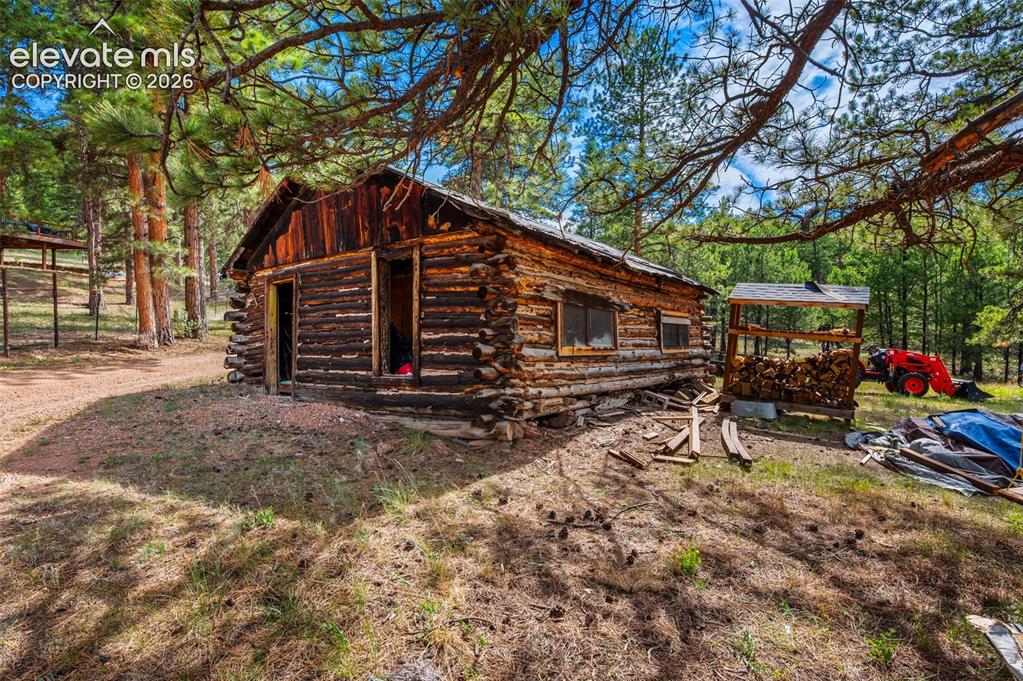 Image 37 of 50: original homestead cabin adds so much character