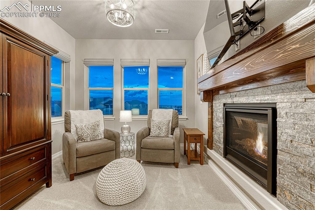 Image 19 of 48: Primary suite sitting area, a perfect place to start or end your day