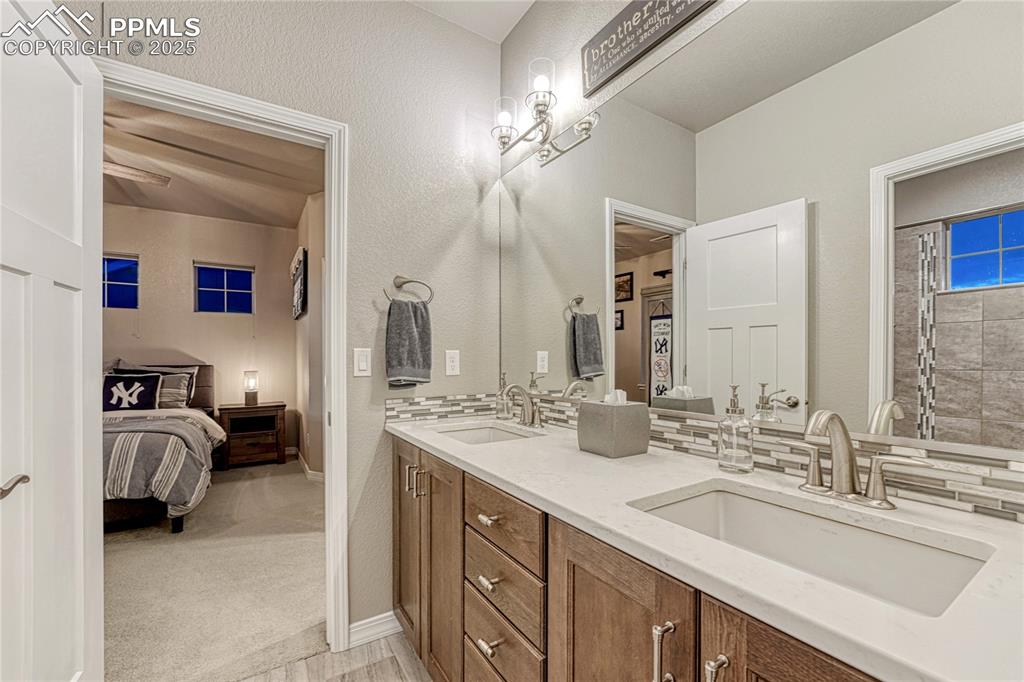 Image 24 of 48: Jack-and-Jill bathroom on the upper level