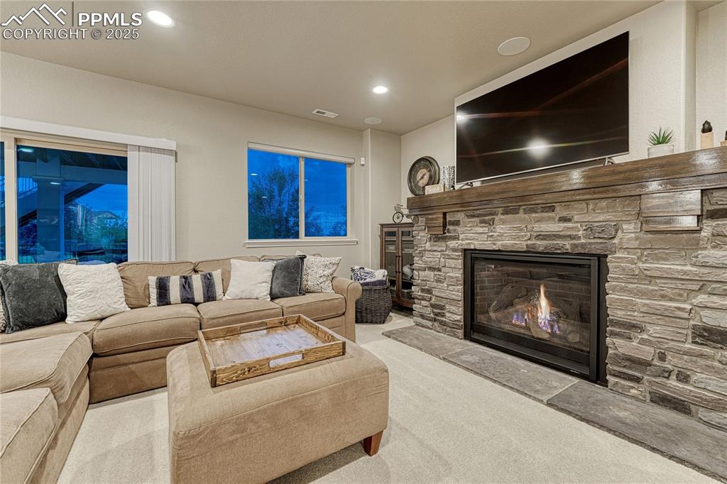 Image 28 of 48: Family room, perfect for movie night and entertaining - and easy access to 