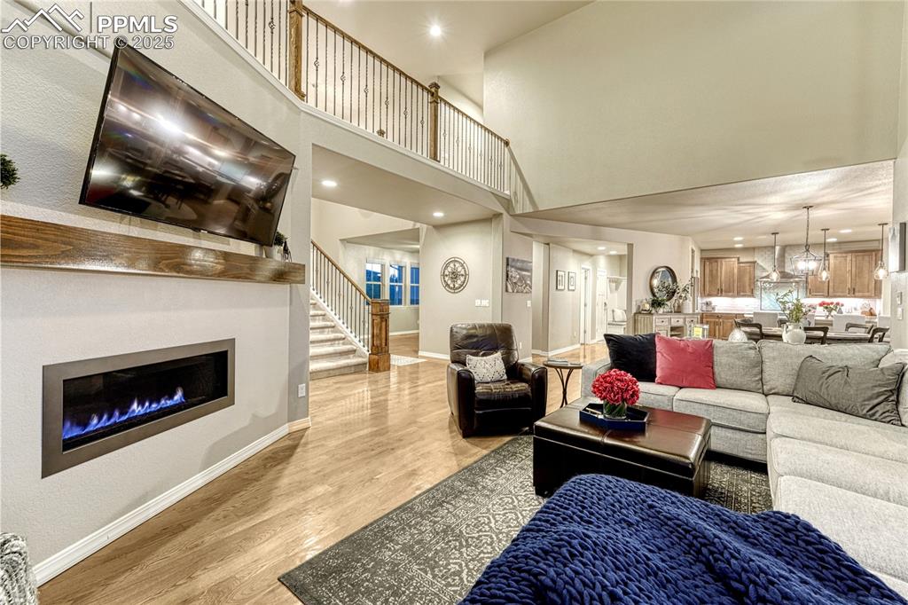 Image 3 of 48: Open floor plan, from living room to dining area and kitchen