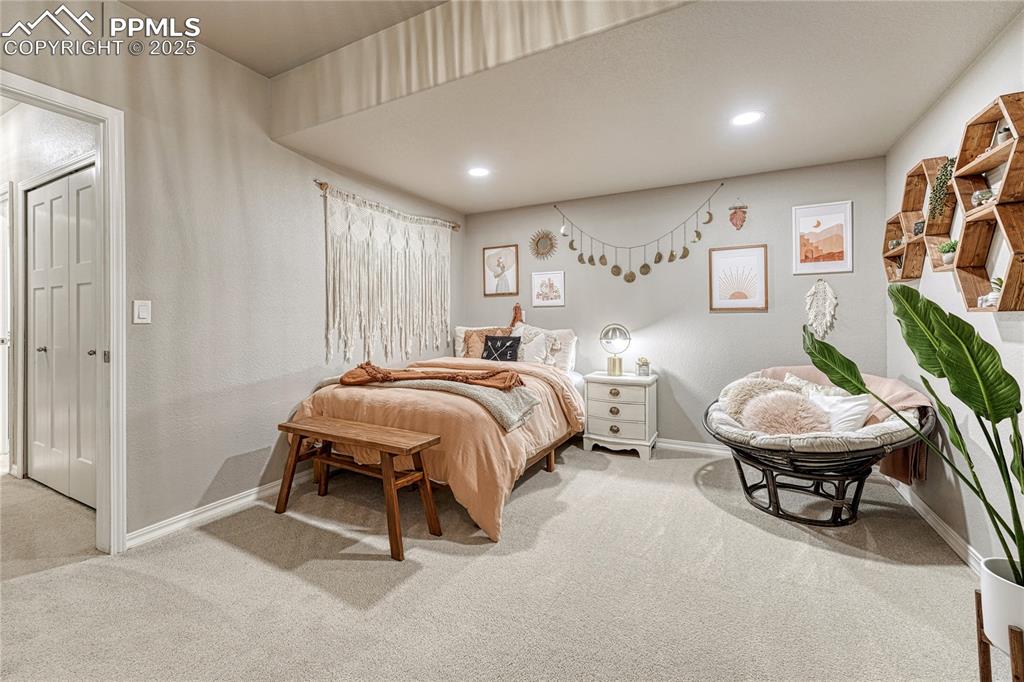 Image 34 of 48: Basement bedroom