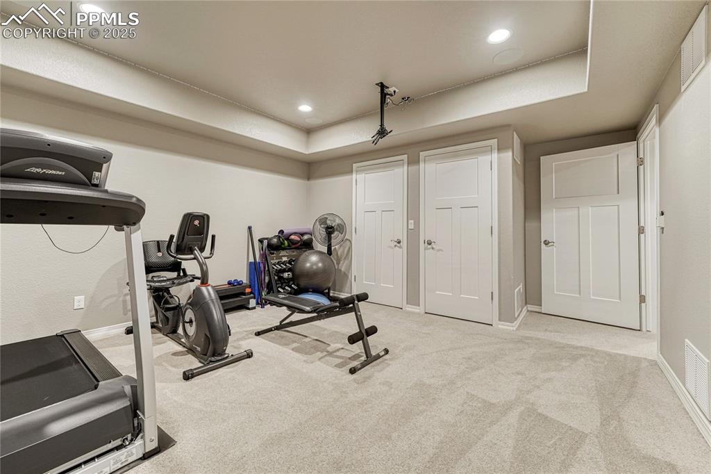 Image 37 of 48: Exercise room, can also be used as a media room
