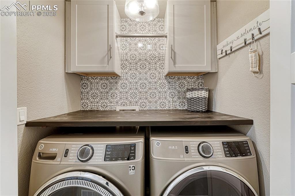 Image 38 of 48: Laundry room - one of two! 