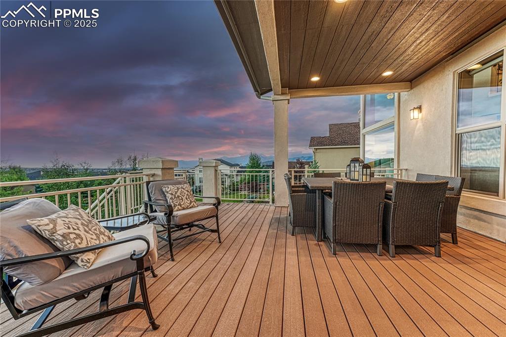 Image 40 of 48: Main level deck, right off of the kitchen.  Perfect for dining, entertainin