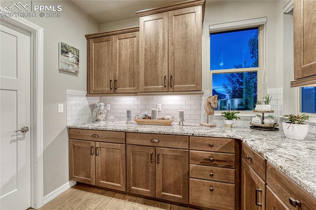 Image 9 of 48: Kitchen prep area, leads to large walk-in pantry!