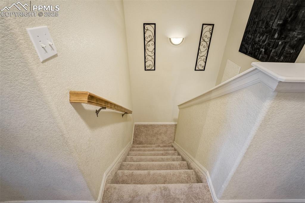Image 12 of 28: Stairs lead to all 4 bedrooms. 