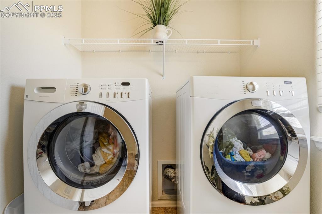 Image 25 of 28: Laundry room (with a window) on the same level as the bedrooms. 