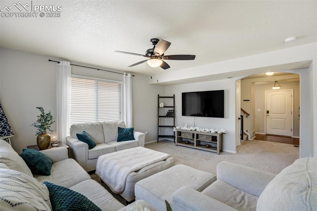 Image 3 of 28: Lovely main level with all new carpet! 