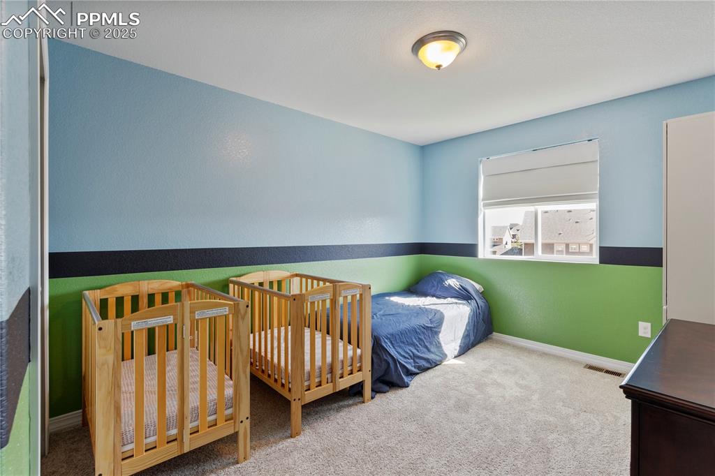 Image 19 of 38: Bedroom #3 located upstairs