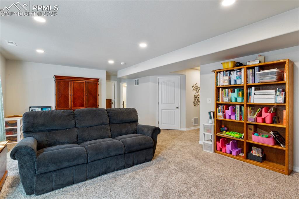 Image 23 of 38: Family room in basement