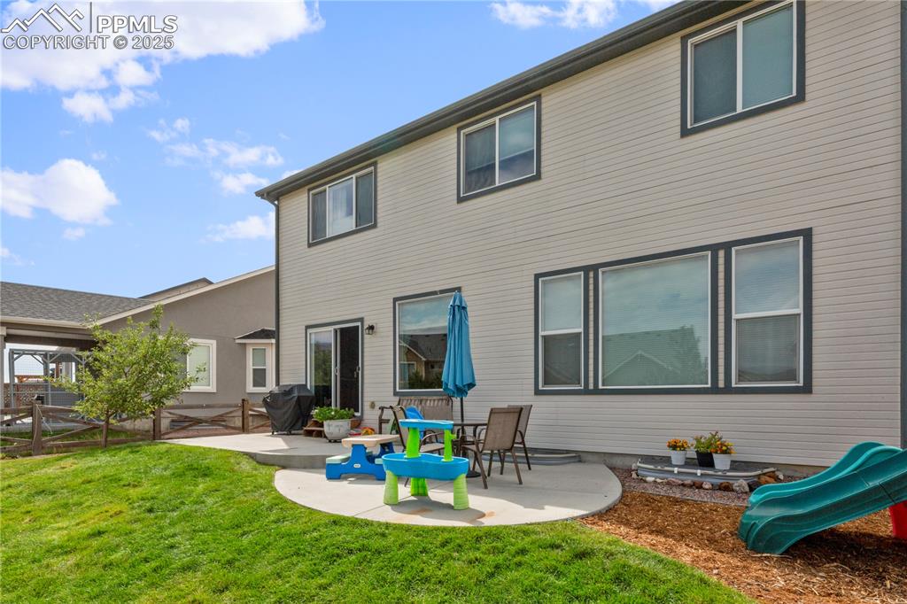 Image 29 of 38: Large custom concrete patio