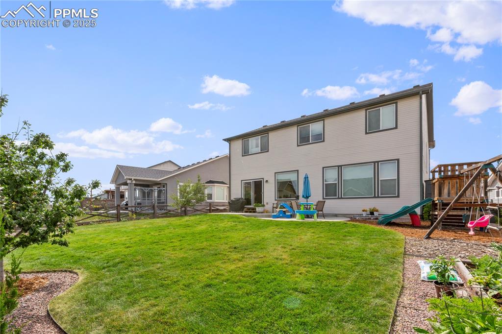 Image 32 of 38: Full landscaping in back yard