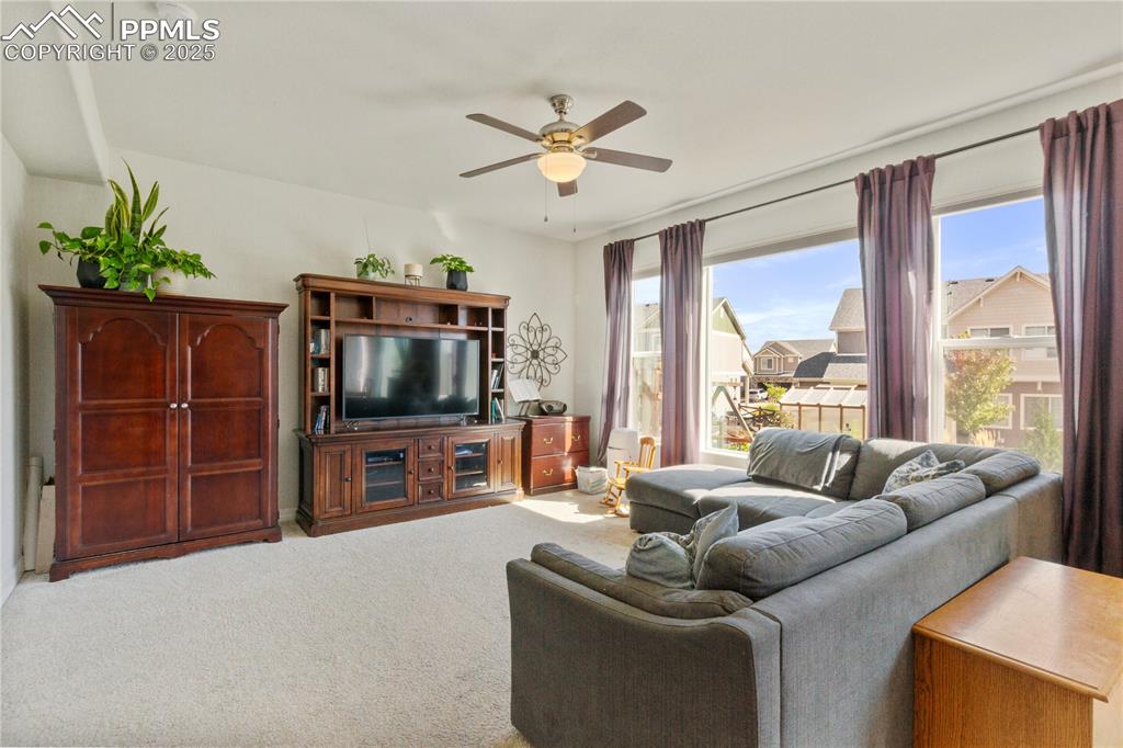 Image 5 of 38: Lots of light in the living room