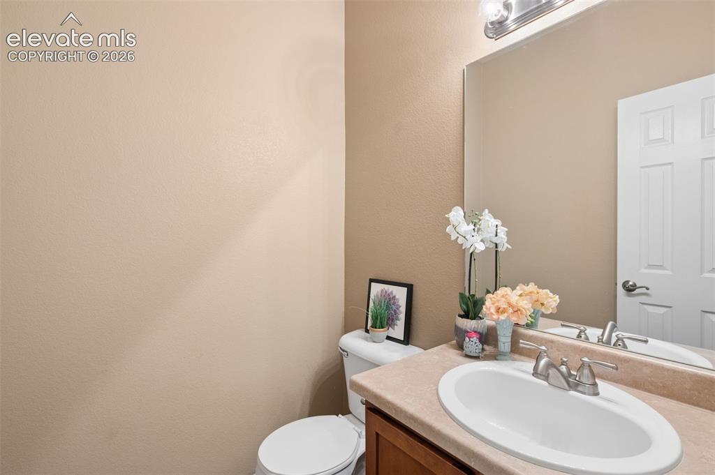 Image 22 of 33: Bathroom Number 3 is a 1/2 Bath On The Main Floor