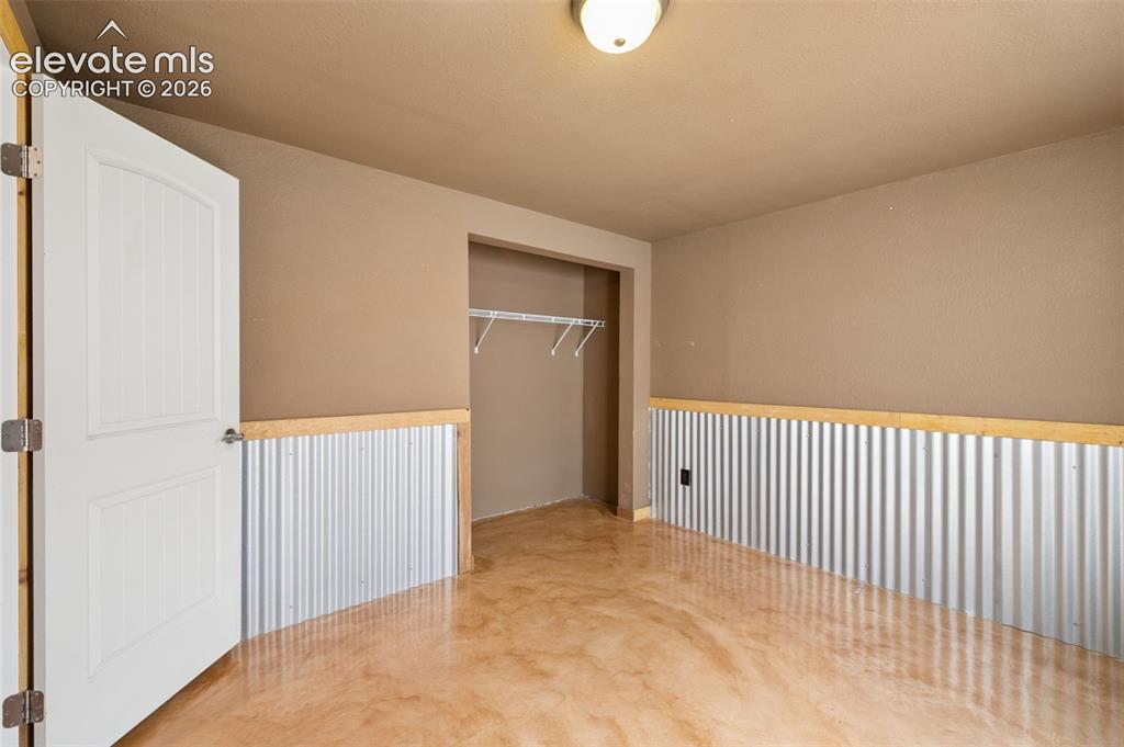 Image 24 of 34: ORIGINAL PHOTO : Bedroom Number 5 - Located In The Basement With More Priva