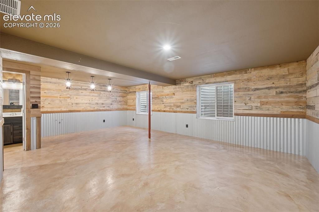 Image 26 of 33: ORIGINAL PHOTO : Living Space Number 3 - Colorado Luxury Rustic Basement wi