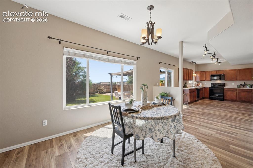 Image 8 of 33: Dining Room Open To Kitchen 