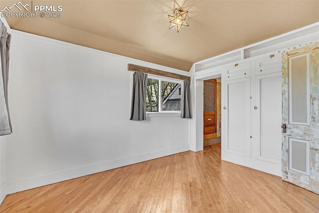 Image 14 of 50: Main Bedroom with entry into large closet and attached 3/4 bath