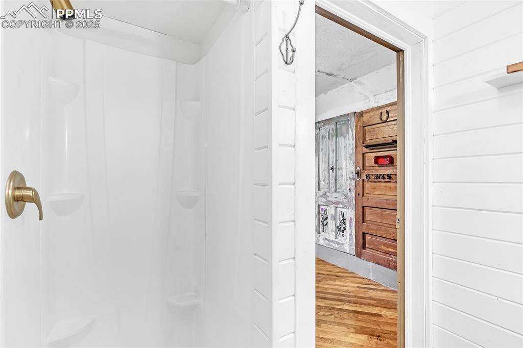 Image 19 of 50: 3/4 bath featuring off the main bedroom via extra large closet.