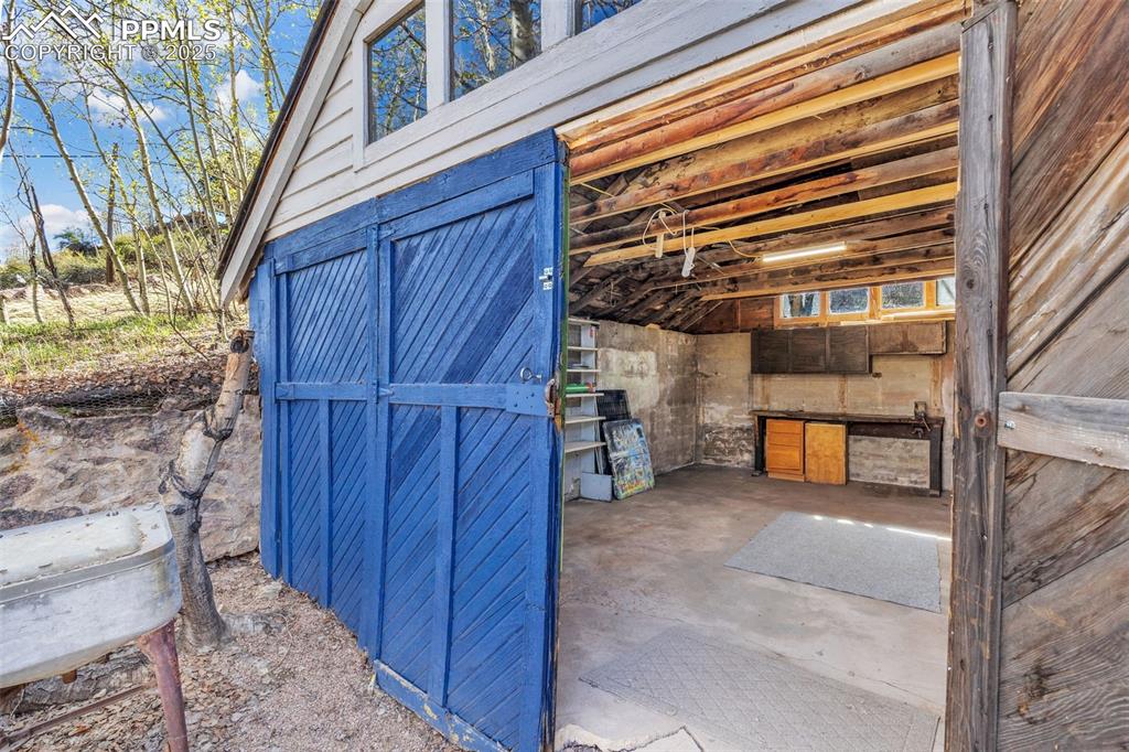 Image 43 of 50: Interior view of detached 1-car garage