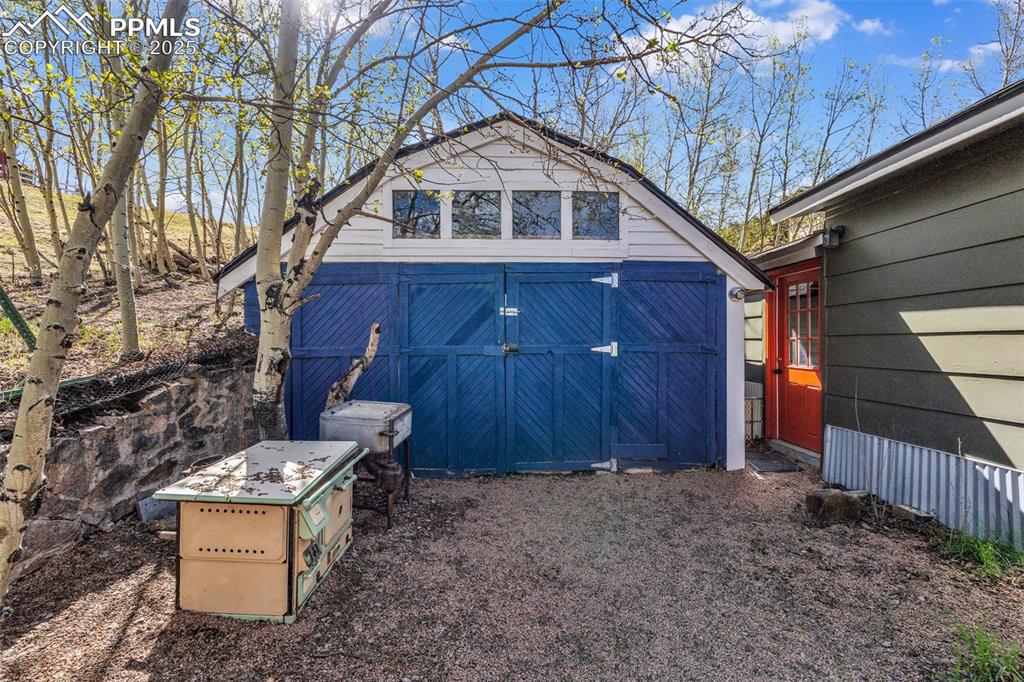 Image 44 of 50: Back yard with access to Garage