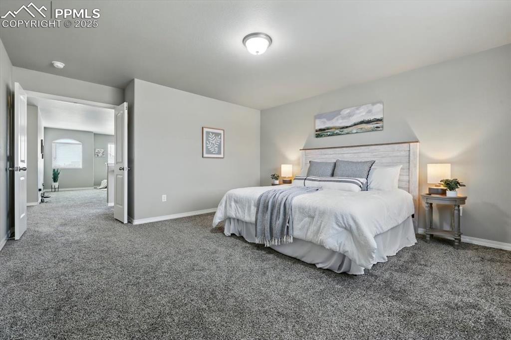 Image 24 of 45: Bedroom featuring carpet flooring and baseboards