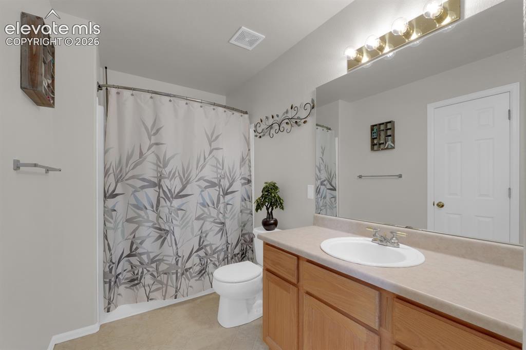 Image 13 of 26: Primary bathroom