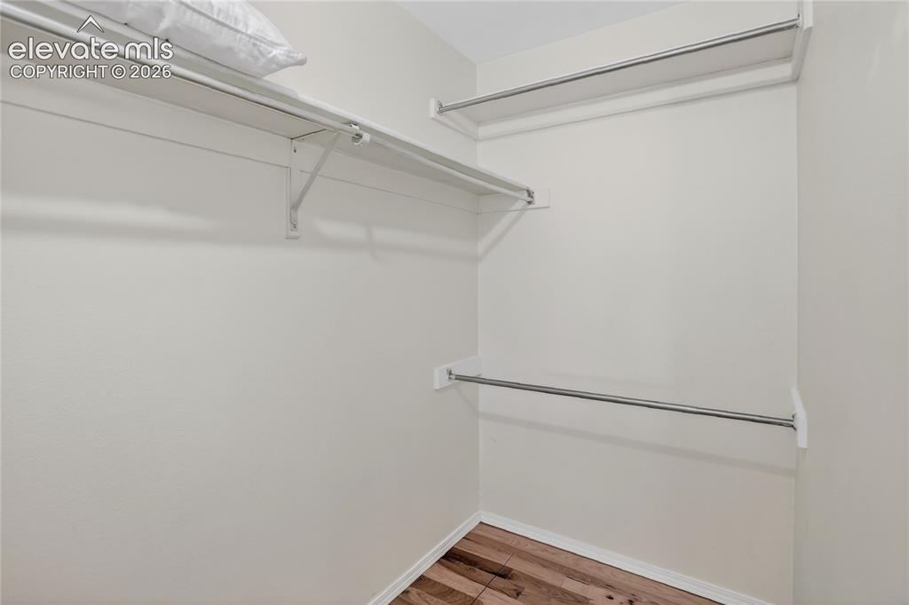 Image 11 of 16: Secondary suite walk-in closet