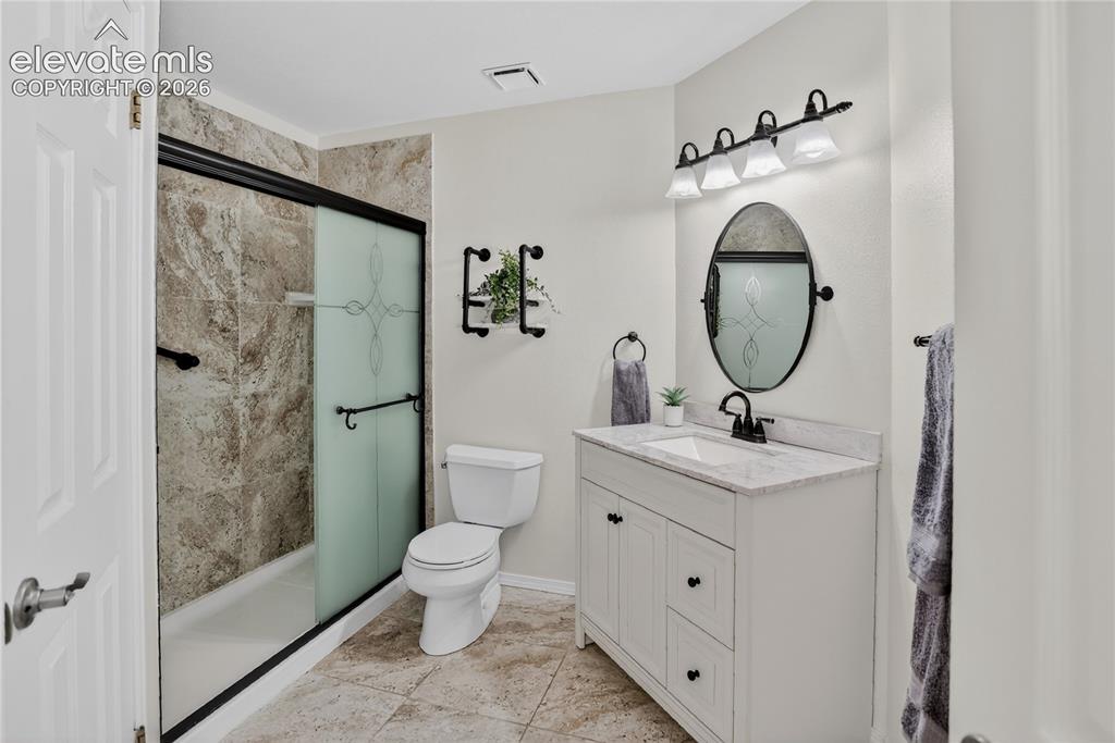 Image 12 of 16: Main-level bathroom