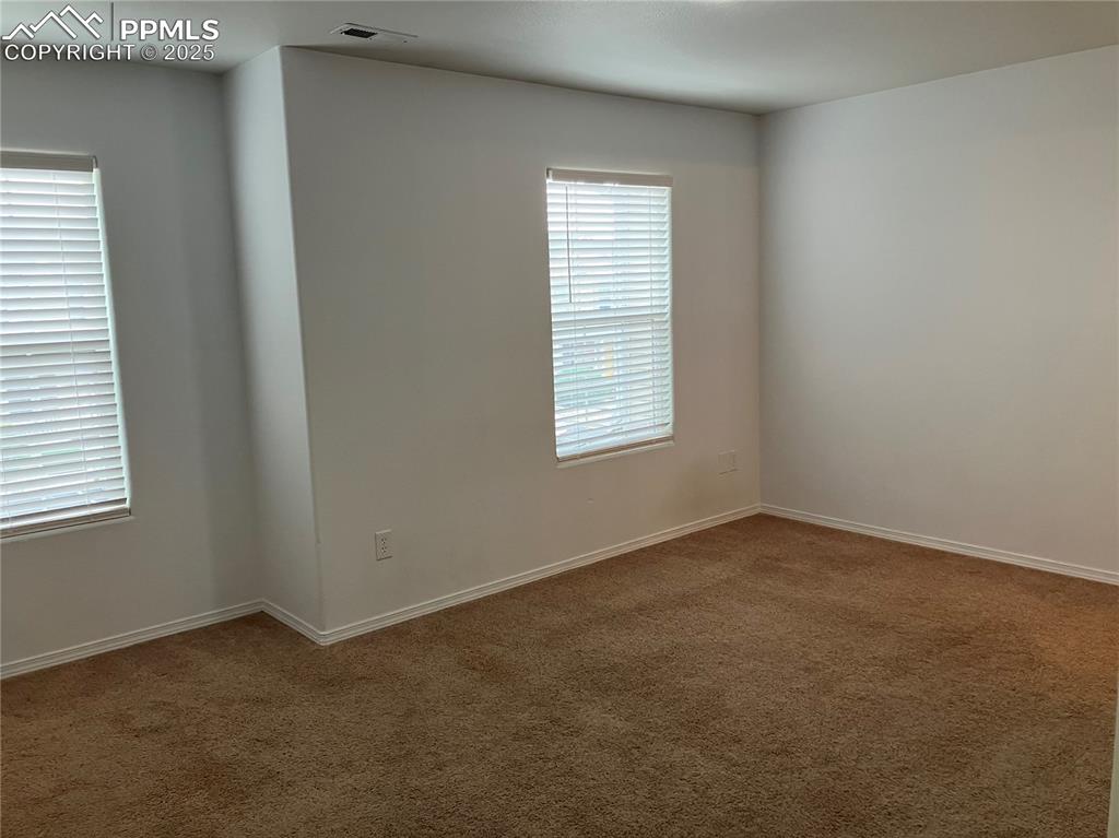 Image 11 of 18: Bedroom with attached bathroom, walkin closet