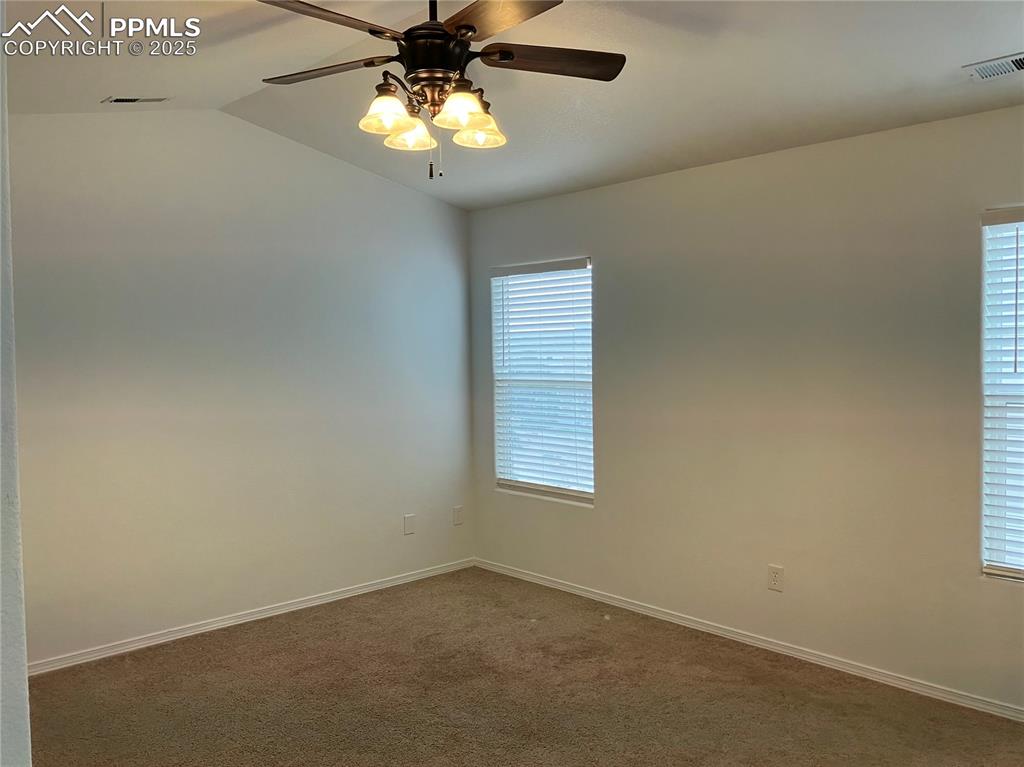 Image 16 of 18: Vaulted ceilings, 2 closets