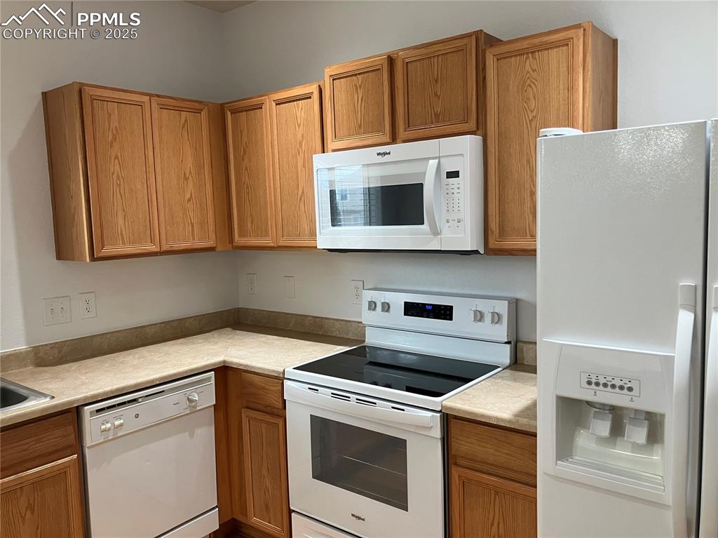 Image 4 of 18: New stove, microwave, refrigerator