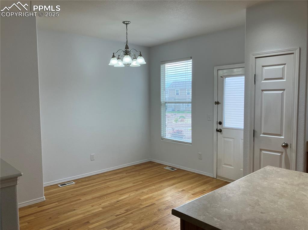 Image 6 of 18: Hardwood floors